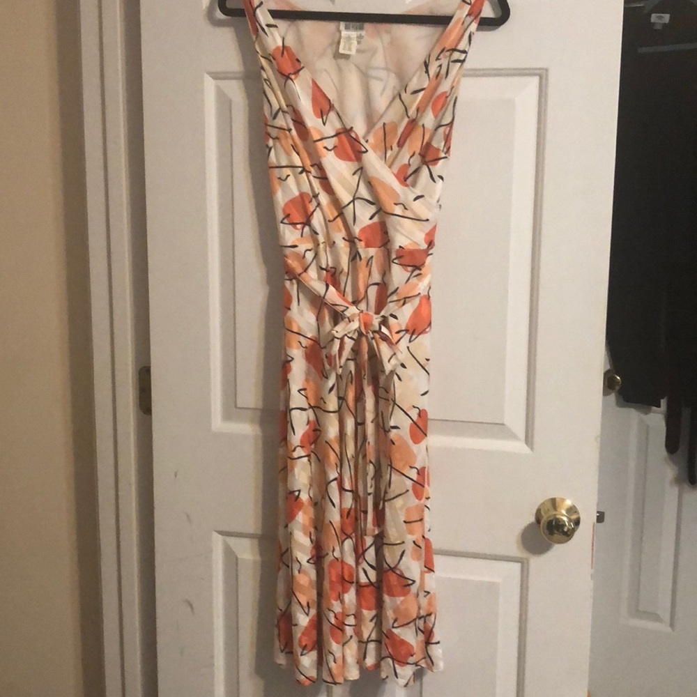 Wrap top flare dress.